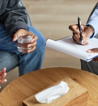 Adolescent Psychologist Taking to Boy